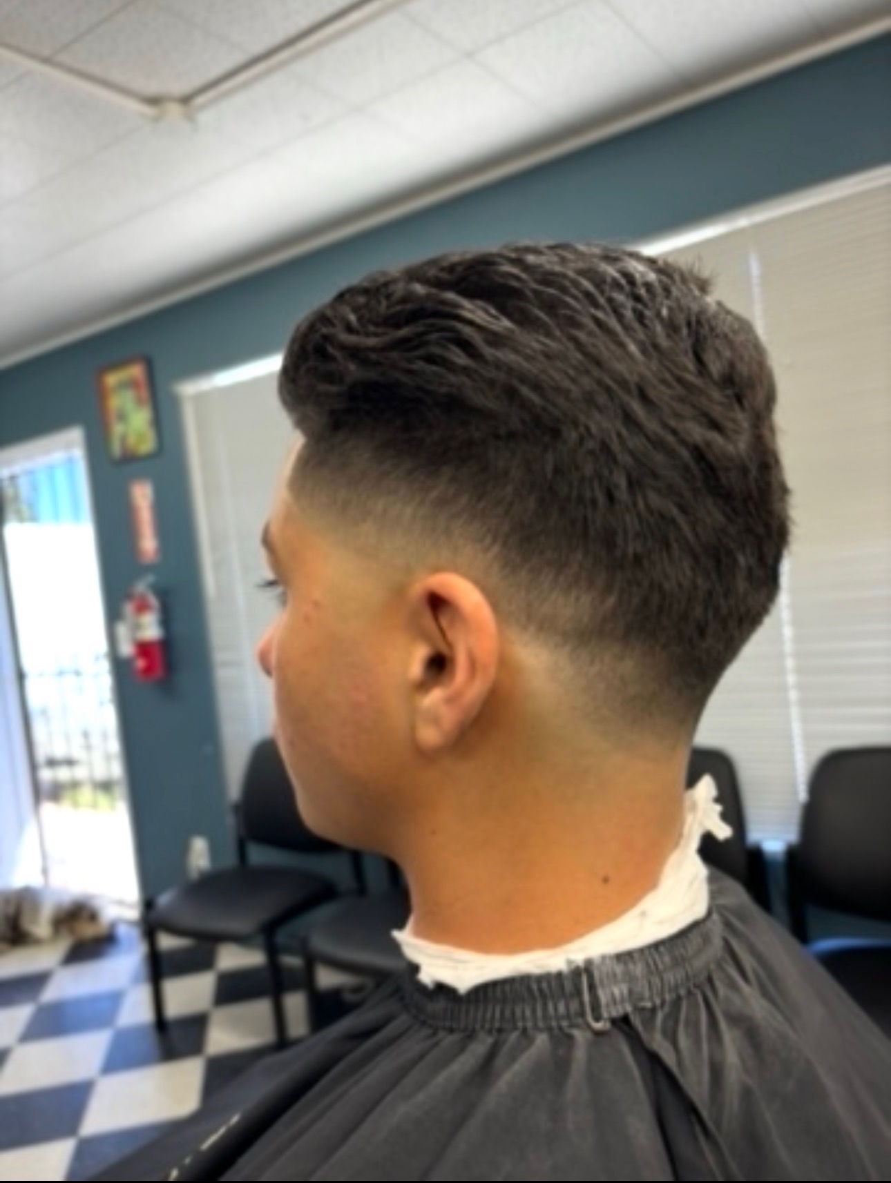 Low Taper + Texture haircut by Dapper B's Barbershop